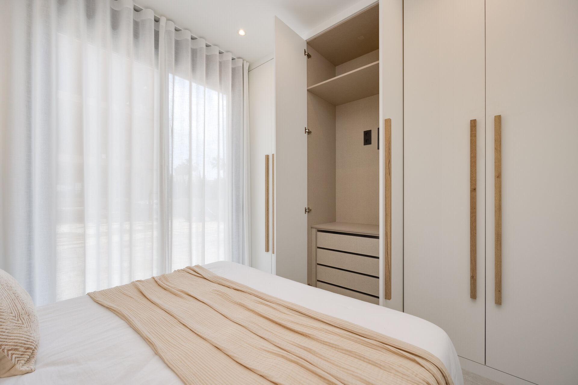 Dunara Resort — show home main bedroom wardrobe