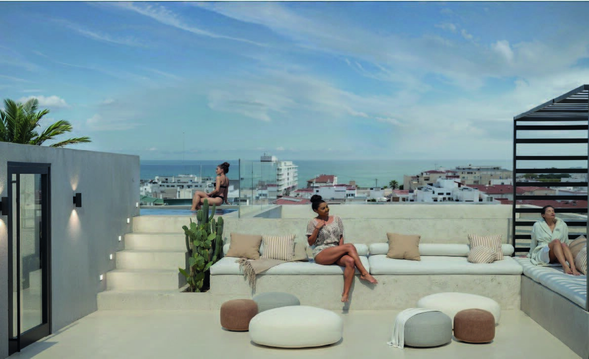 Edificio Antonella — rooftop solarium lounge seating
