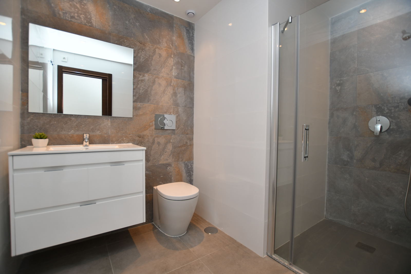 Master bathroom — stone tiles
