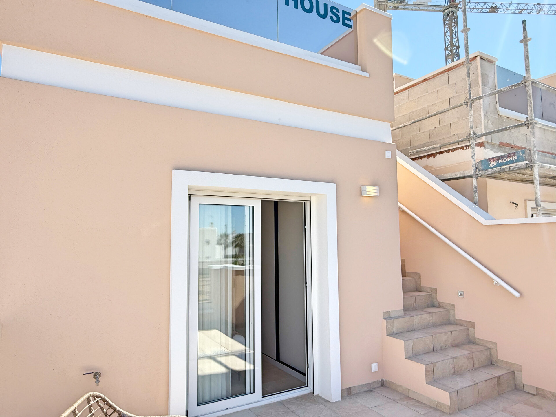 Townhouse showhouse — terrace with solarium stairs