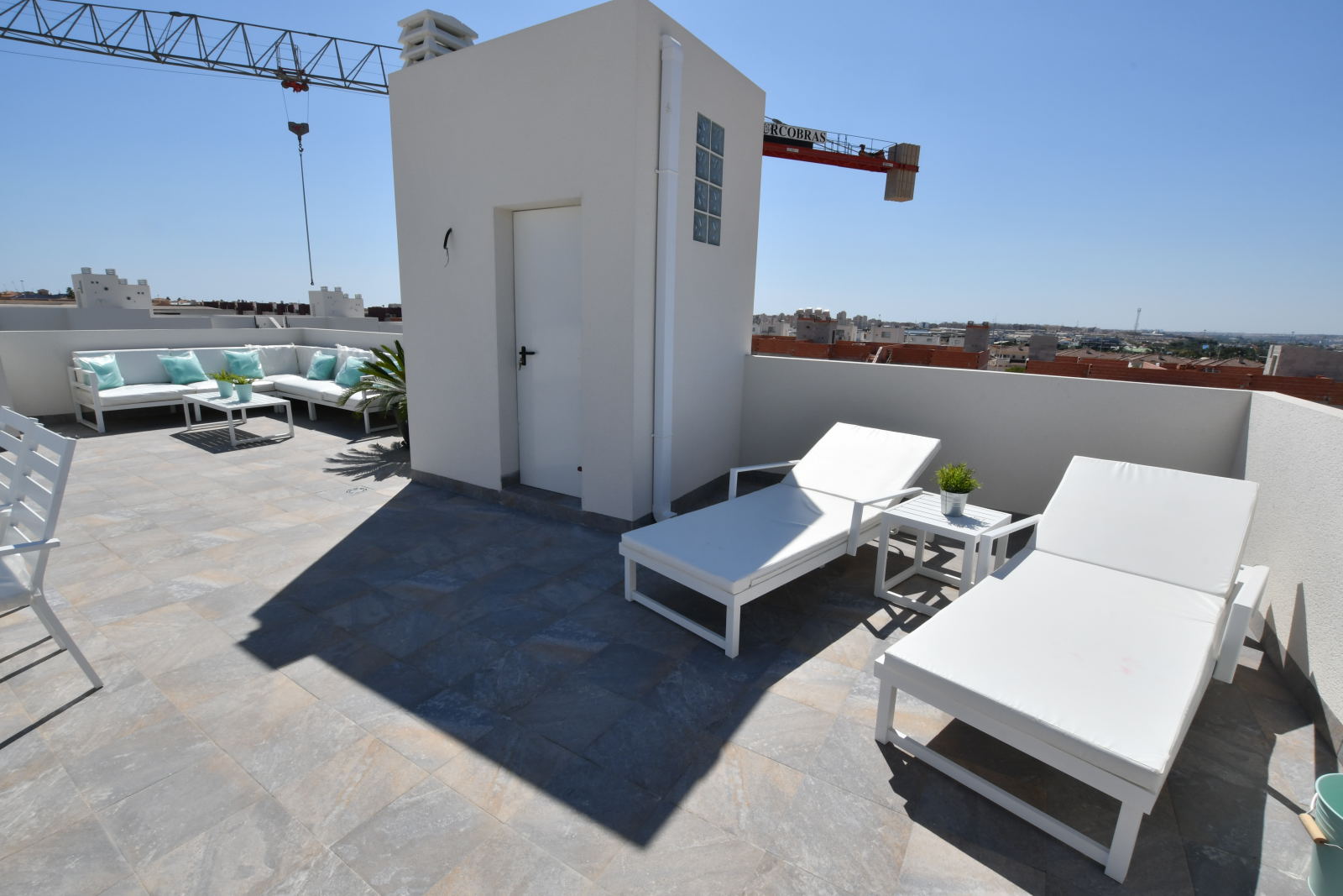 Rooftop terrace with sun loungers