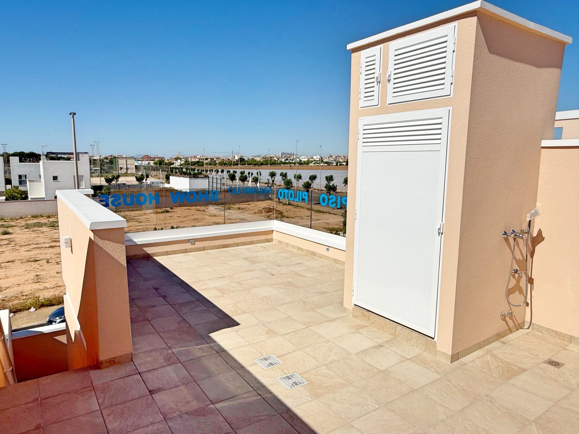 Townhouse showhouse — rooftop solarium with views